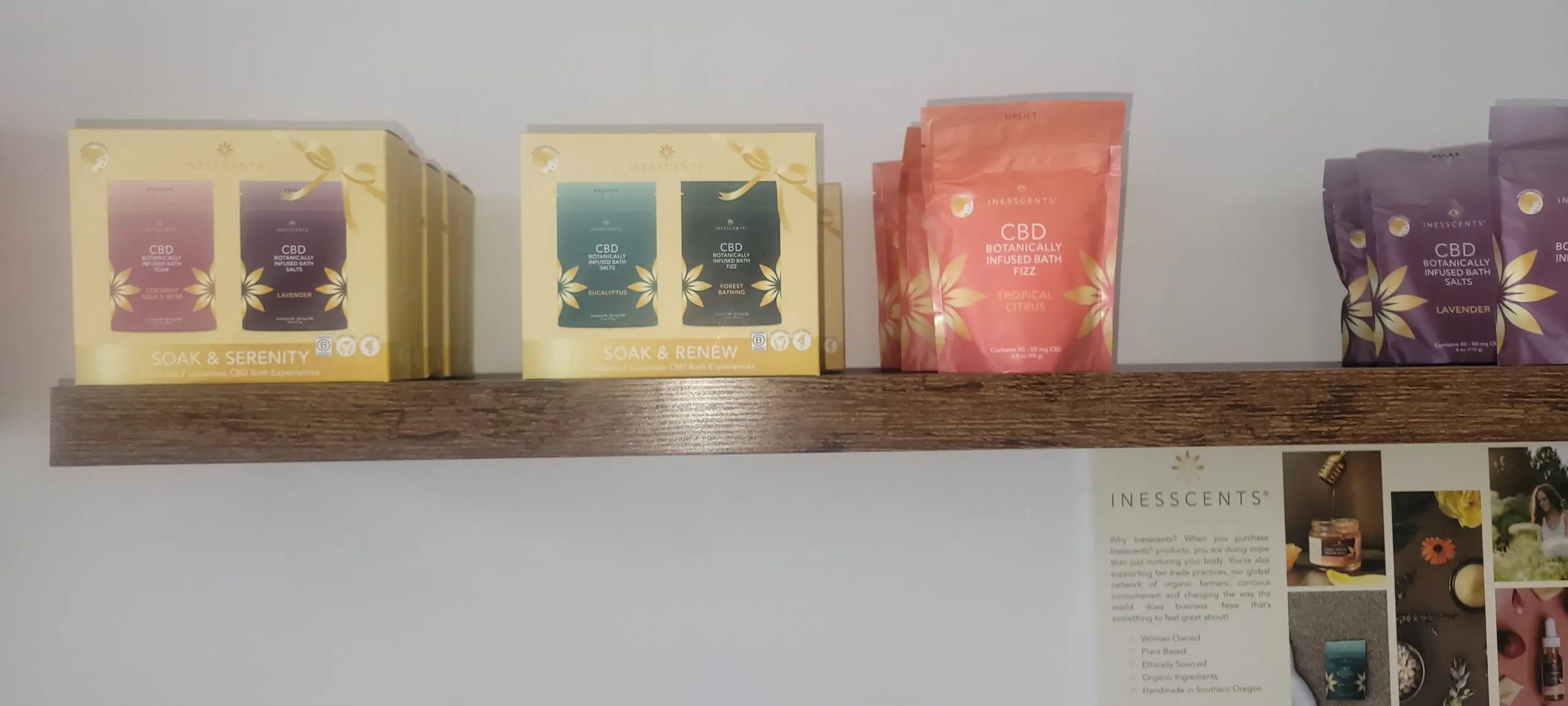 Shelf with two boxes of tea and a bag of coffee.