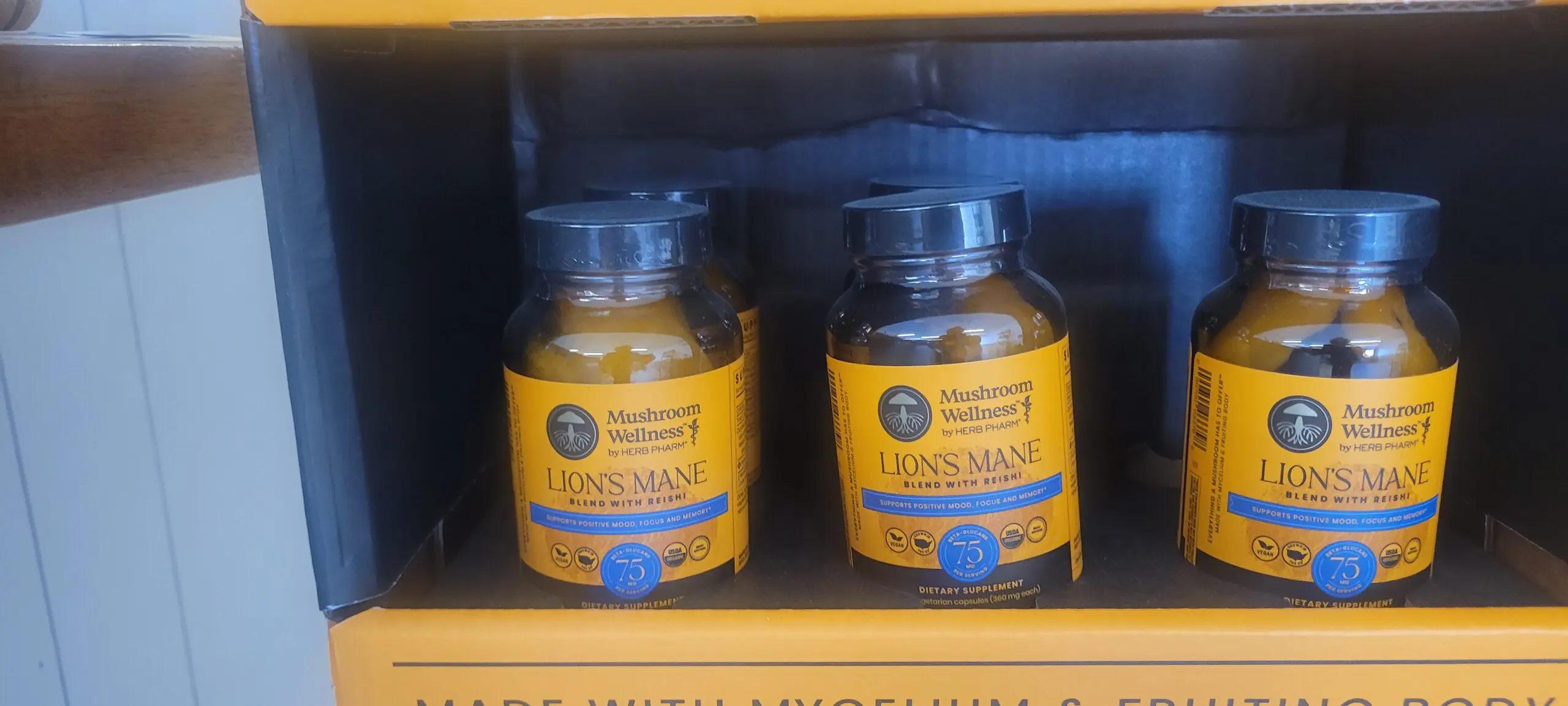 Two bottles of Nature's Way Elderberry Gummies on a shelf.